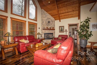 Great Room has vaulted ceilings and a stone gas fi