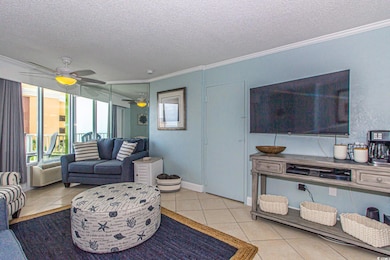 Living room featuring light tile patterned floorin