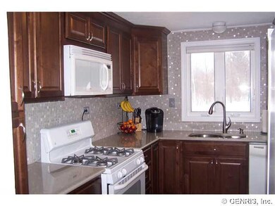Kitchen. New Kitchen. Quartz Counters. Tiled Backs