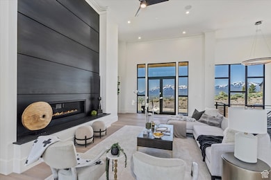 mtn views fill the great room, soaring ceiling height, steel fireplace