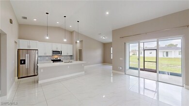 Kitchen featuring appliances with stainless steel