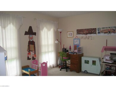 The living room is currently utilized as a play room.