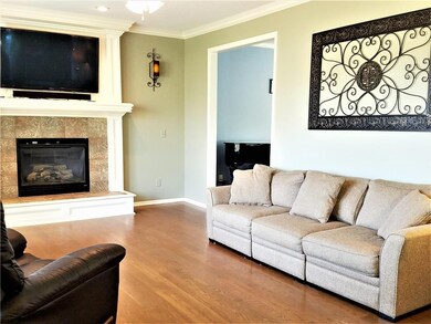 Great Room with Gas Log Fireplace, Hardwood Floors