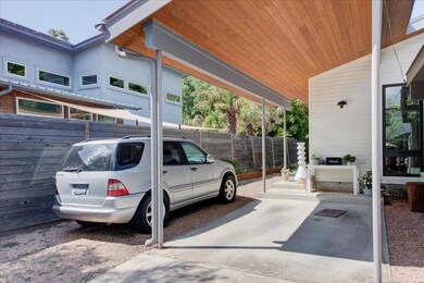 Covered parking for 1 car *fence added since this photo was taken* uncovered parking for a 2nd
