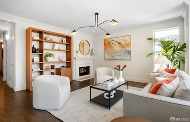 The elegant living room with views of City Hall fe