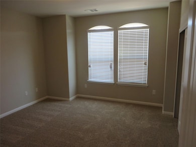 Spare room with a healthy amount of sunlight, bas