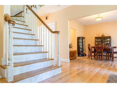 White washed and oak center staircase.