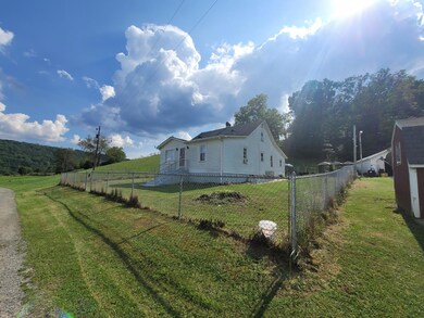 Side/Front of house and fenced area