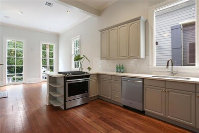 Open kitchen with new stainless steel appliances