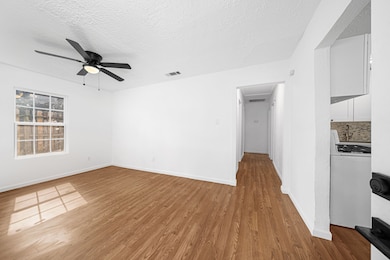 As you enter, you have the living room and then th