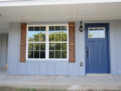 Craftsman front door and fixture.