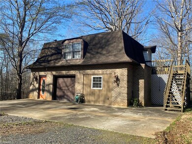 Detached Garage with upstairs apartment.  Downstairs has now been converted to 1BR/1 BA living quarters.