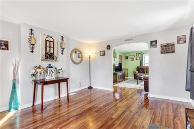 Entrance/living room with gleaming laminate floori