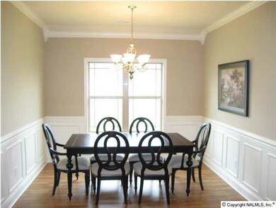 **SIMILAR HOME***LARGE FORMAL DINING ROOM WITH EXTENSIVE TRIM WORK!