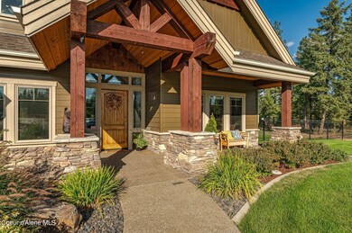 Front entry w/ exposed aggregate walkway