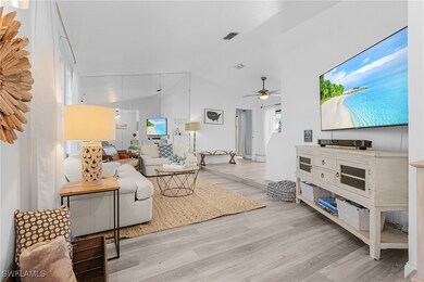 Living area featuring wood finished floors, ceilin