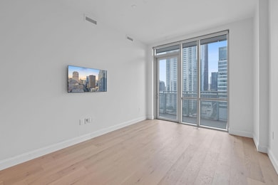 Unfurnished room with light wood-style flooring a
