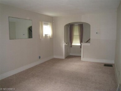 New carpeting in the living room and up the steps.