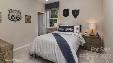 REPRESENTATIVE PHOTOS-Large Secondary bedroom with walk in closet.