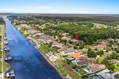 Aerial view of residential area with a nearby body of water