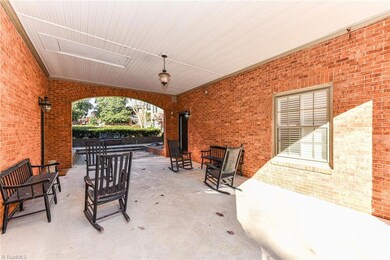 Enter this unit through the breezeway on the right with courtyard ahead.  Storage is available overhead but space can be accessed through the floored attic with pull-down stairs on 2nd floor.