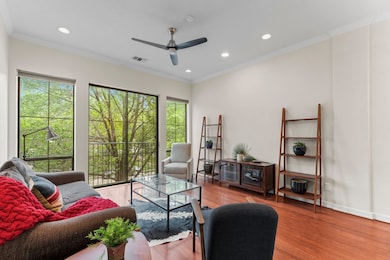 Living area with a view of tree tops!