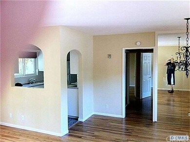 View of the entry to kitchen and hallway from livi