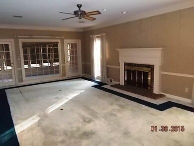 LR-THE SUN ROOM WITH DOOR TO PAITO IS BEHIND THE W