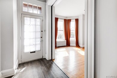 Entrance foyer featuring hardwood / wood-style flooring