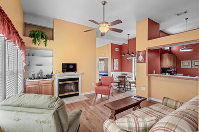 Living room featuring high vaulted ceiling, ceilin