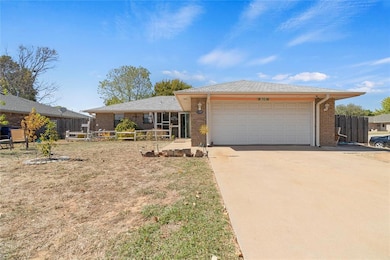 Single story home with a garage
