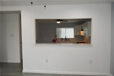 View from Living Room to Kitchen.