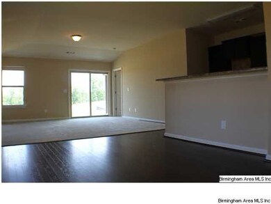 DINING AREA WITH HARDWOOD FLOORING