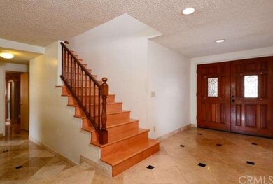 Double doors with beveled inserts, formal entry.