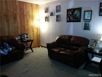 Living Room LARGER THAN IT SEEMS, JUST NEEDS YOUR 