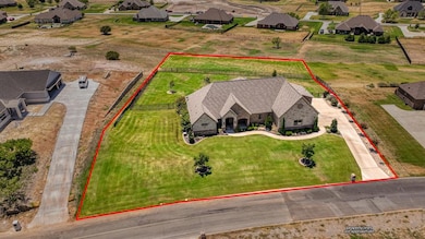 Approximate property lines outlined in red.