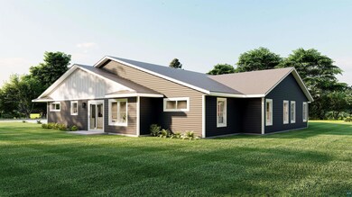 Back of property featuring a yard