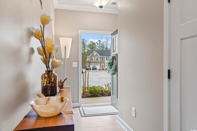 Doorway to outside featuring light hardwood / wood