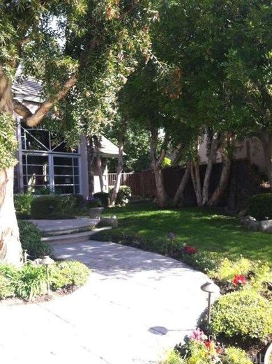 Gorgeous landscaping and foliage along the walkway