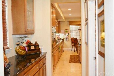Butler's pantry adjacent to walk-in pantry