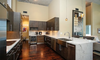 Chef's kitchen features gorgeous natural Quartzite