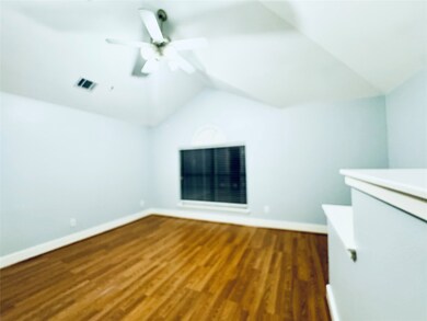 Spacious primary bedroom with built in entertainme