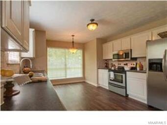 The kitchen has been remodeled with new counter-to