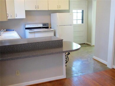 Kitchen looking toward side door