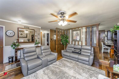 Living room with dark hardwood / wood-style floori