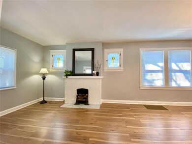 Enter into the living room with original stained g
