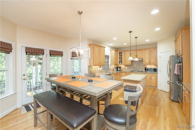 Kitchen with appliances with stainless steel finis