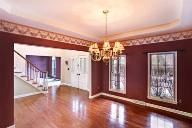 LARGE OPEN FORMAL DINING ROOM WITH BOX TRAY CEILIN