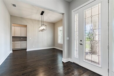 Home under construction. Photos of completed home of same floor plan.