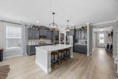 Kitchen featuring stainless steel appliances, deco